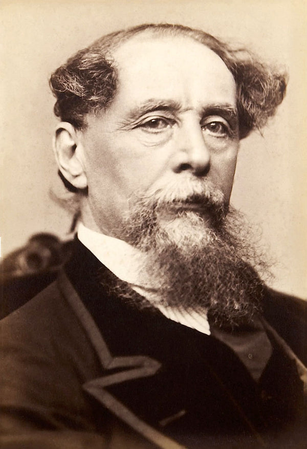 Vintage photograph of a man with a beard and formal attire, Charles Dickens